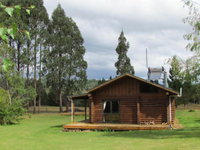 Triple Tui Log Cabin