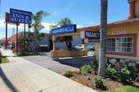 Delmonico Inn  Suites