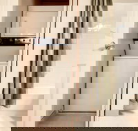 Global Luxury Suites at Commodore Drive - Tourism Bookings