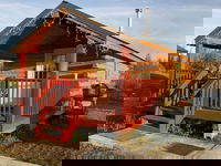 Alaska log cabins on the pond B  B