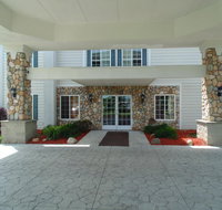 American Inn and Suites Houghton Lake - Tourism Bookings