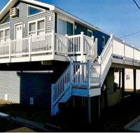 Ship Bottom Oceanside raised ranch neat clean and very close to the beah. Located on quiet street walkinng distance to shops  - Tourism Bookings