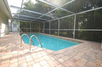 2 BR 2 BA w/family rm extra sleeper small community dock screened heated pool Tourism Bookings