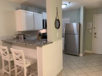 2 BR/BA Condo - Boardwalk to Beach. 3 Pools. Tennis Courts Tourism Bookings