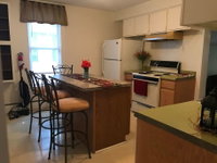 Cozy 2nd story Flat near downtown Tourism Bookings