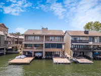 Lake LBJ Waterfront Townhouse with Private Boat Slip and Steps from HSB Resort Tourism Bookings