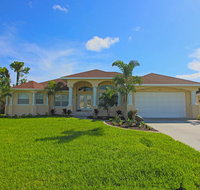 Luxurious 4 bedroom with 2 master suites 4 baths heated pool and spa home located on a canal. - Tourism Bookings