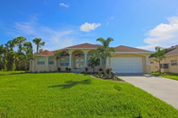 Luxurious 4 bedroom with 2 master suites 4 baths heated pool and spa home located on a canal. Tourism Bookings