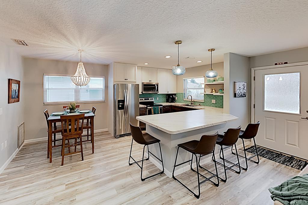 New Listing! Updated Coastal Gem W/ Screened Porch Home - thumb 2