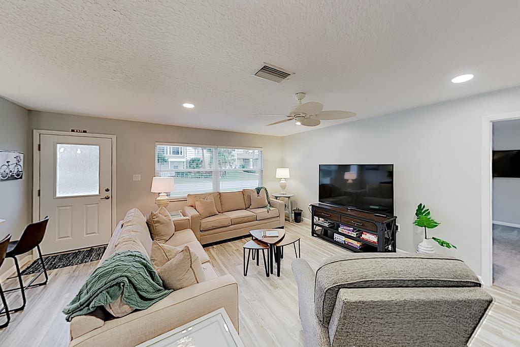 New Listing! Updated Coastal Gem W/ Screened Porch Home - thumb 1