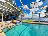 Riverfront Paradise w/ Caged Pool Hot Tub  Dock home Tourism Bookings