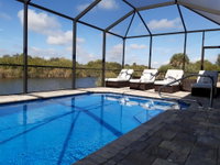 Stunning BRAND NEW 3 bed home fabulous pool overlooking river Tourism Bookings